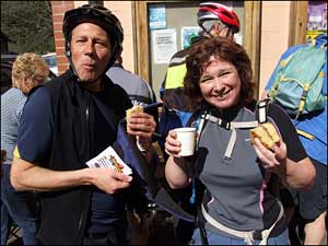 Lee and  Anne soak the sun and scoff the cakes!